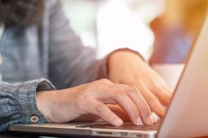 stock-woman-working-laptop